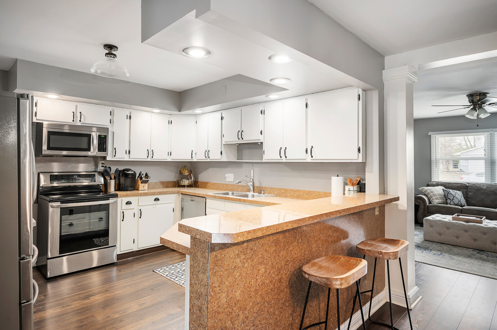 Bright residential kitchen photographed from the adjoining living area
